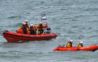 A pair of lifeboats at sea