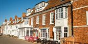 Historic red brick seafront buildings in Burnham, by James Crisp